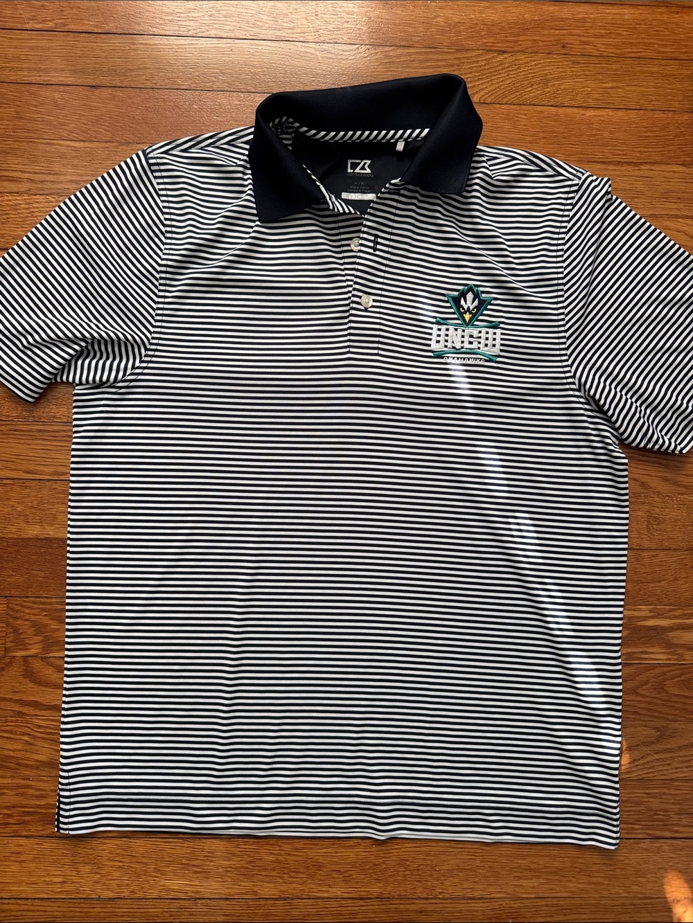 Cutter & Buck Navy and White Striped Polo with UNCW Crest